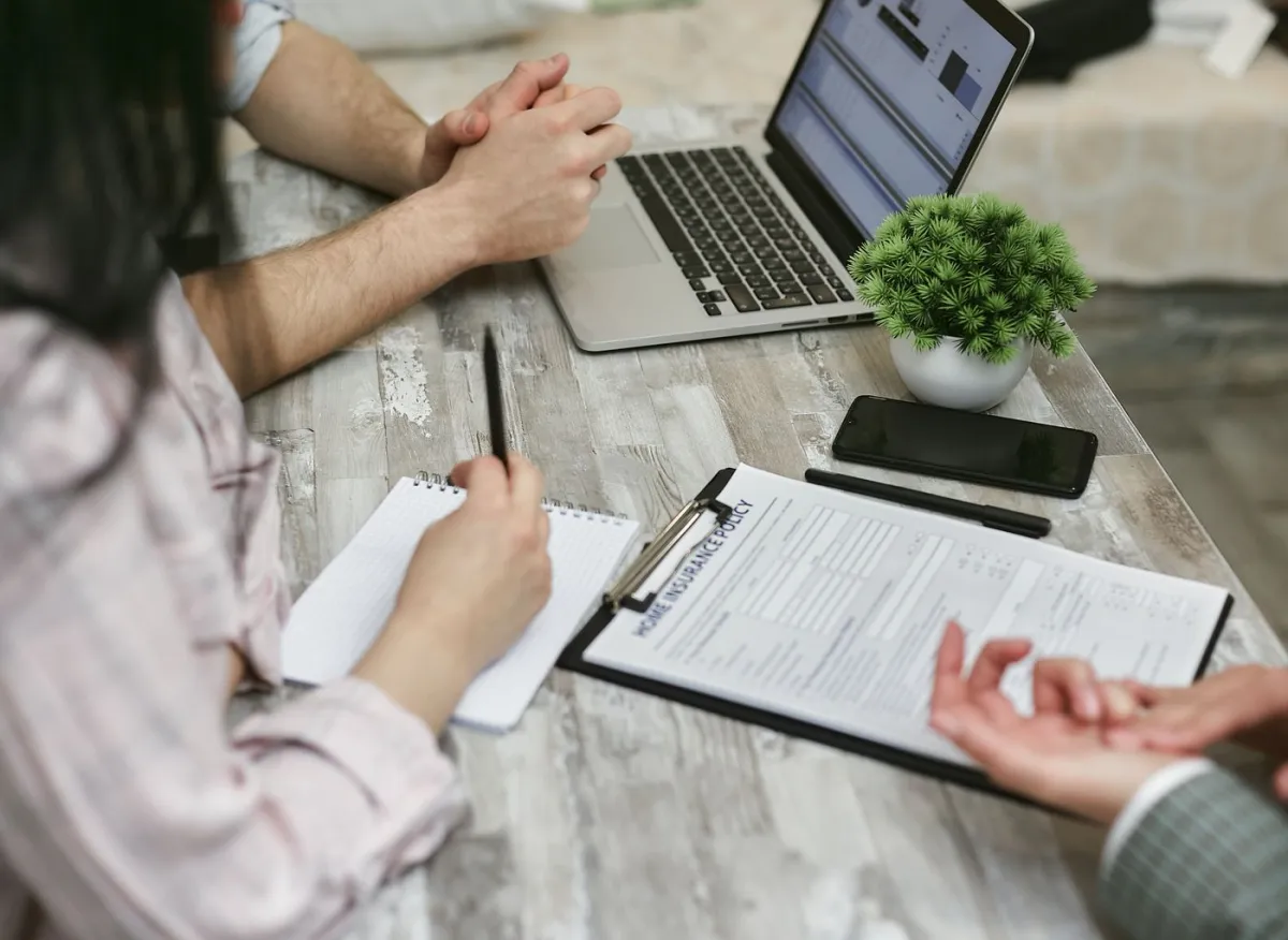 Client discussing adverse-credit mortgage options